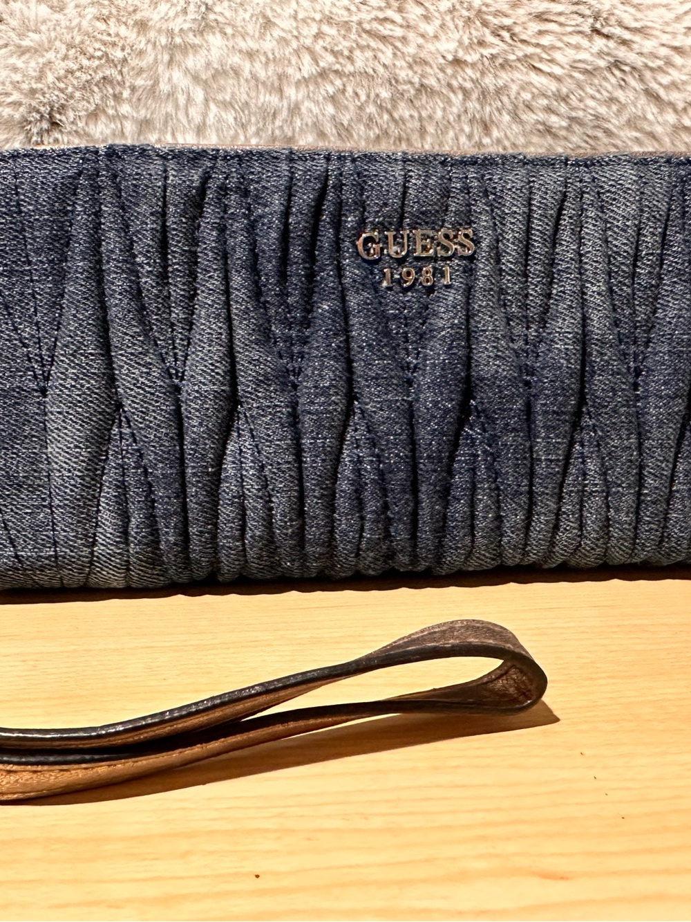 GUESS Navy Denim Quilted Wristlet Clutch with Gold Logo